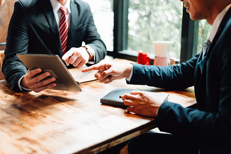 Two businessmen in a meeting