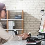 Business woman having a video conference