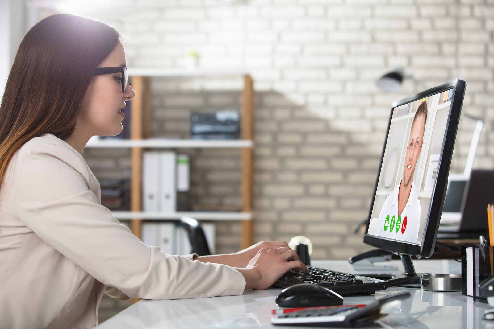Business woman having a video conference