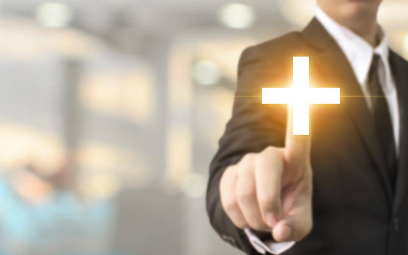 Business man adding value