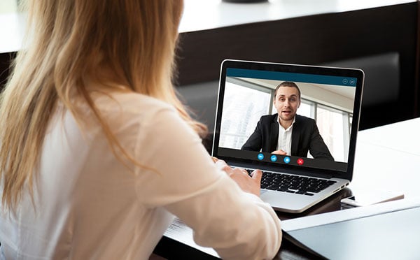 Businesswoman making video call to business partner using laptop, looking at screen with virtual web chat, contacting client by conference, talking on webcam, online consultation, hr concept, close up