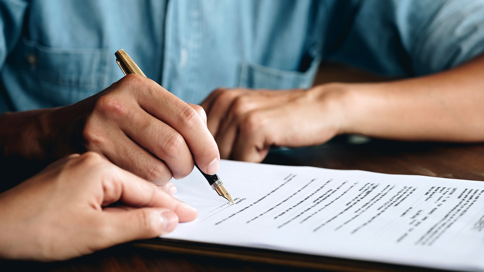 signing contract closeup