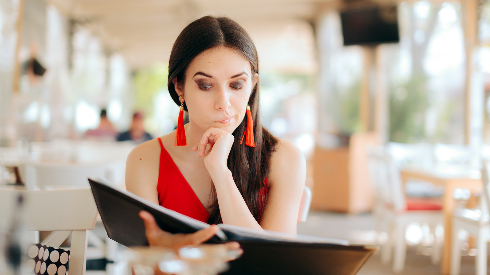 woman reading menu