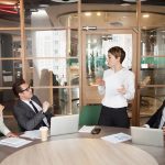Business woman conducting a meeting