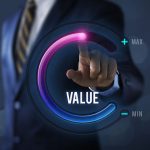 Growth value, increase value, value added or business growth concept. Businessman is pulling up circle progress bar with the word VALUE on dark tone background.