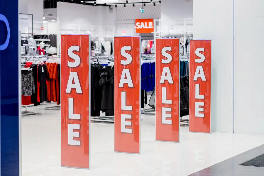 Sale signs at the entrance of a retail store
