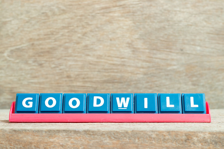 Tile Alphabet Letter With Word Goodwill In Red Color Rack On Woo