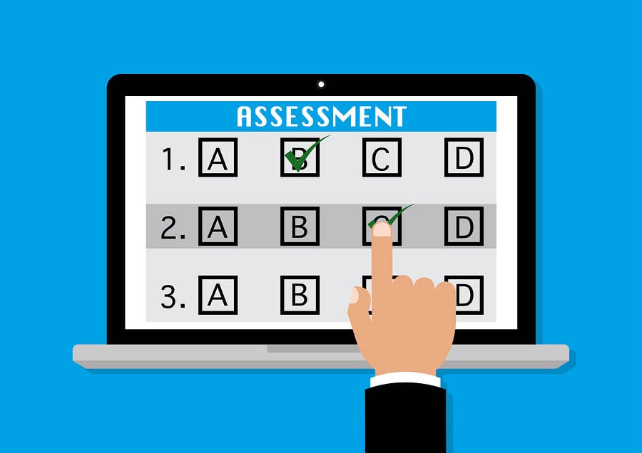 Online survey assessment on computer laptop