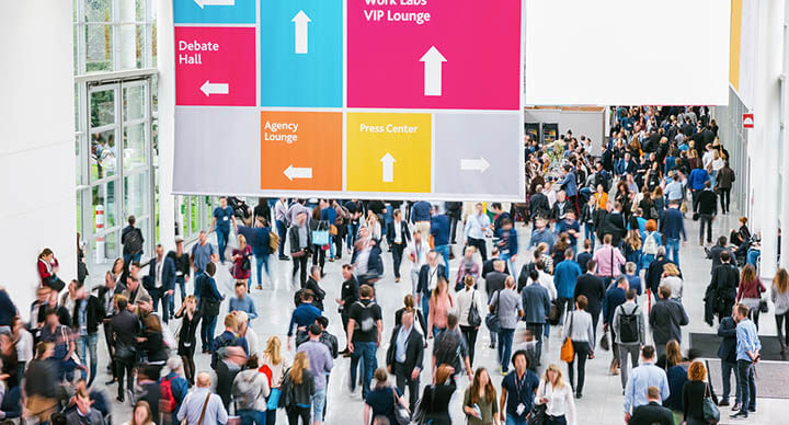 People at an exhibition selling
