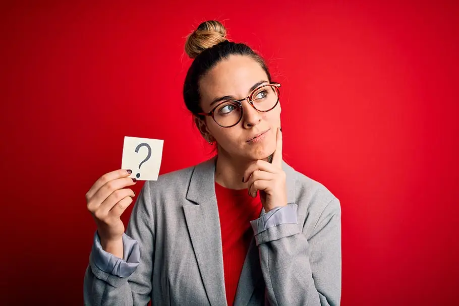 Lady thinking about what sales questions to ask