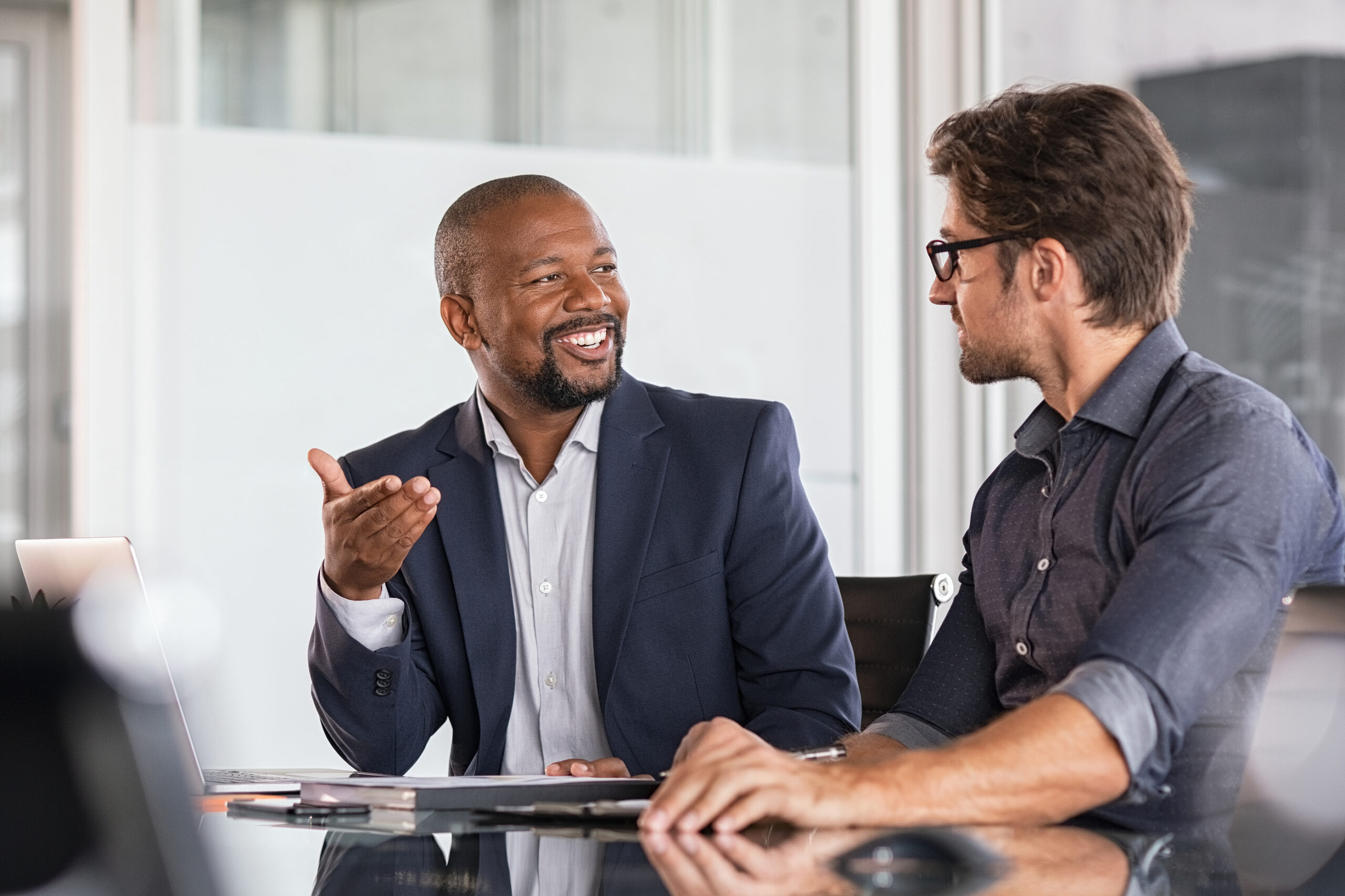 Salesperson-and-client-engaged-conversation